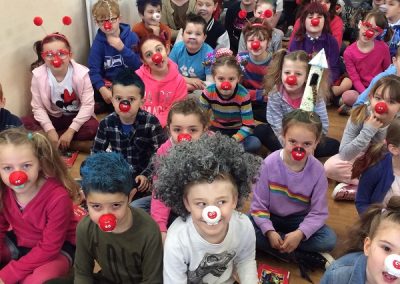 Some of the school with their red noses and mad hair.