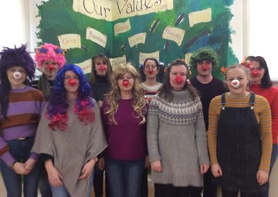 The staff with their red noses and mad hair.