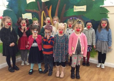 Reception with their red noses and mad hair.