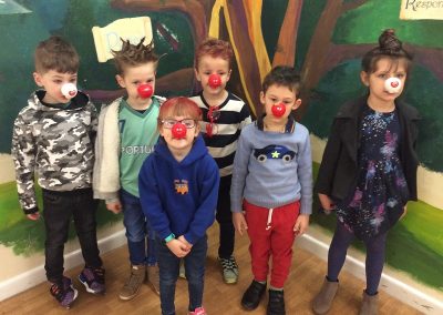 Year 1 with their red noses and mad hair.