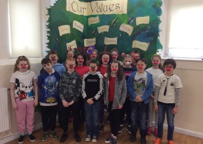 Year 6 with their red noses and mad hair.